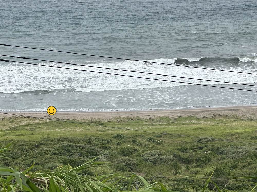 高台から見下ろしたキャンプマナビスの海エリア布良海岸